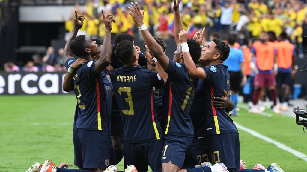 Piero Hincapie of Ecuador celebrates with teammates after an own goal scored by Kasey Palmer of Jamaica (not in frame) during the CONMEBOL Copa America 2024. Photo by Candice Ward/Getty Images