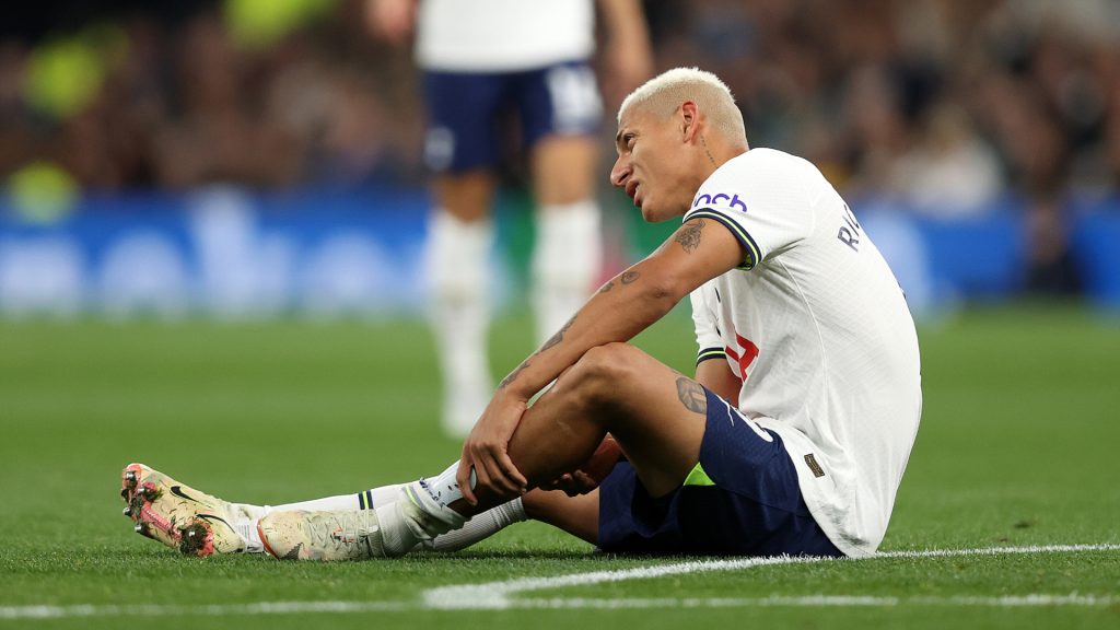 Richarlison of Tottenham Hotspur goes down injured during the Premier League match between Tottenham Hotspur and Everton. Julian Finney/Getty Images